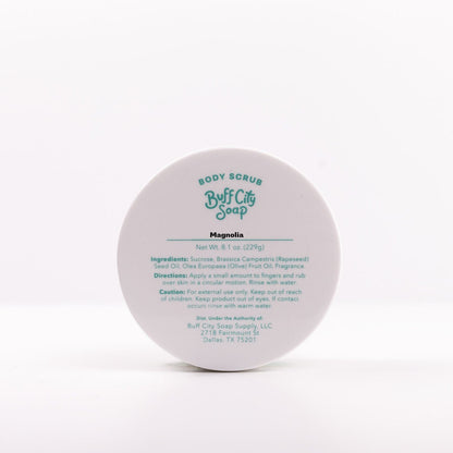 lid of Buff City Soap's magnolia scented body scrub listing the directions, ingredients and cautions